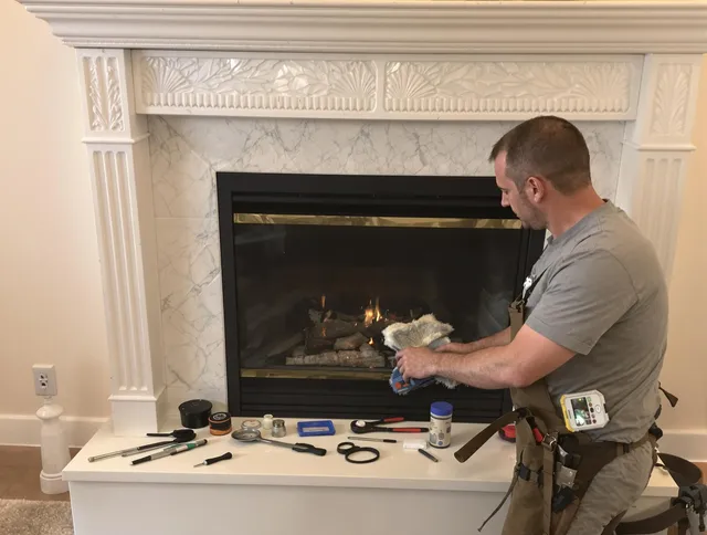 North Miami Chimney Sweep performing fireplace maintenance in North Miami, FL