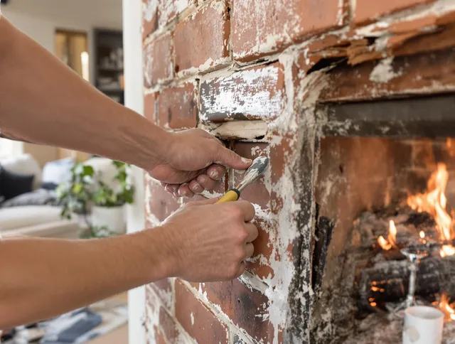 Routine fireplace repair by North Miami Chimney Sweep in North Miami, FL